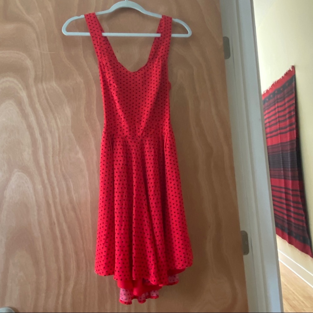 Red dress with back dots, tied back